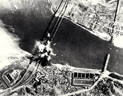 U.S. bombs drop on railway bridges at Seoul in early July, 1950
