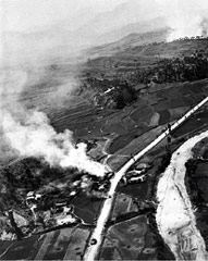 American F-80 jet strafes an enemy T34 tank and jeep