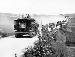 Dust cloud from vehicle on Korean dirt road