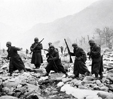 Members of the Turkish Brigade move into position in December, 1950