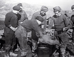 Soldiers of the English Gloucestershire Regiment battalion stop for afternoon tea