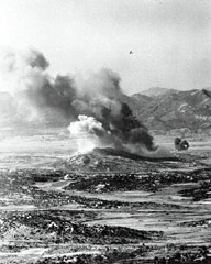 A marine F4U Corsair pulls up from a bombing run